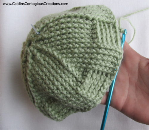 Free crochet pattern for a warm and thick winter cap. Spiral Star basket weave cap design from Caitlin's Contagious Creations.